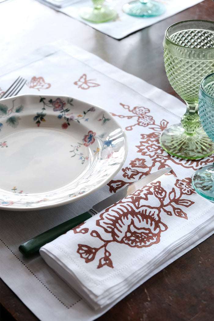 white linen placemats and napkins red floral printed