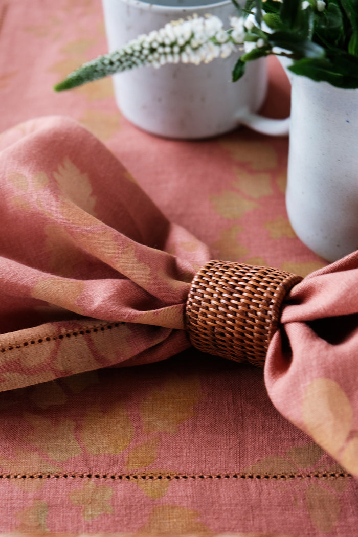 red linen placemats and napkins hand painted
