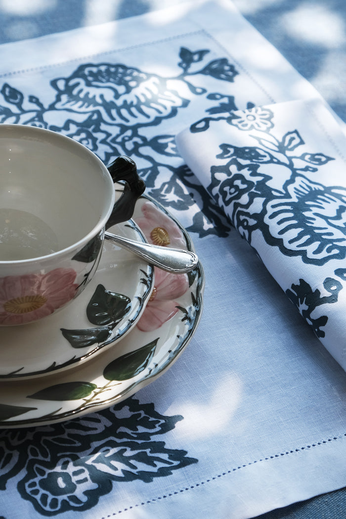 white linen placemats and napkins blue floral printed