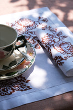SET OF TWO BLOCK PRINTED AJOUR LINEN PLACEMATS & NAPKINS